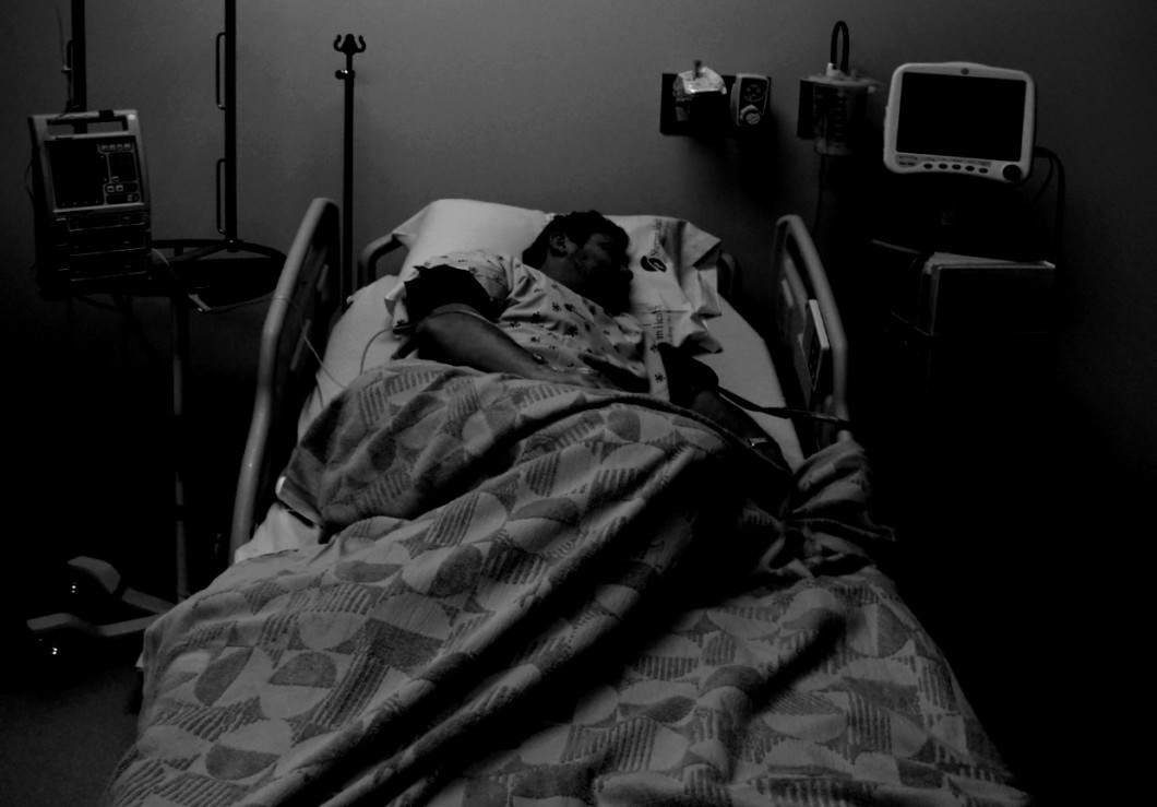Photo of patient in bed Bedridden - photo by Christine Gleason https://www.flickr.com/photos/cmgxvolley/