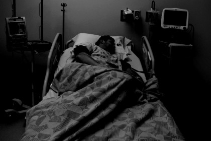 Photo of patient in bed Bedridden - photo by Christine Gleason https://www.flickr.com/photos/cmgxvolley/