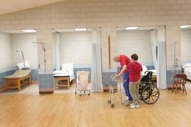 Man using walker in a nursing home