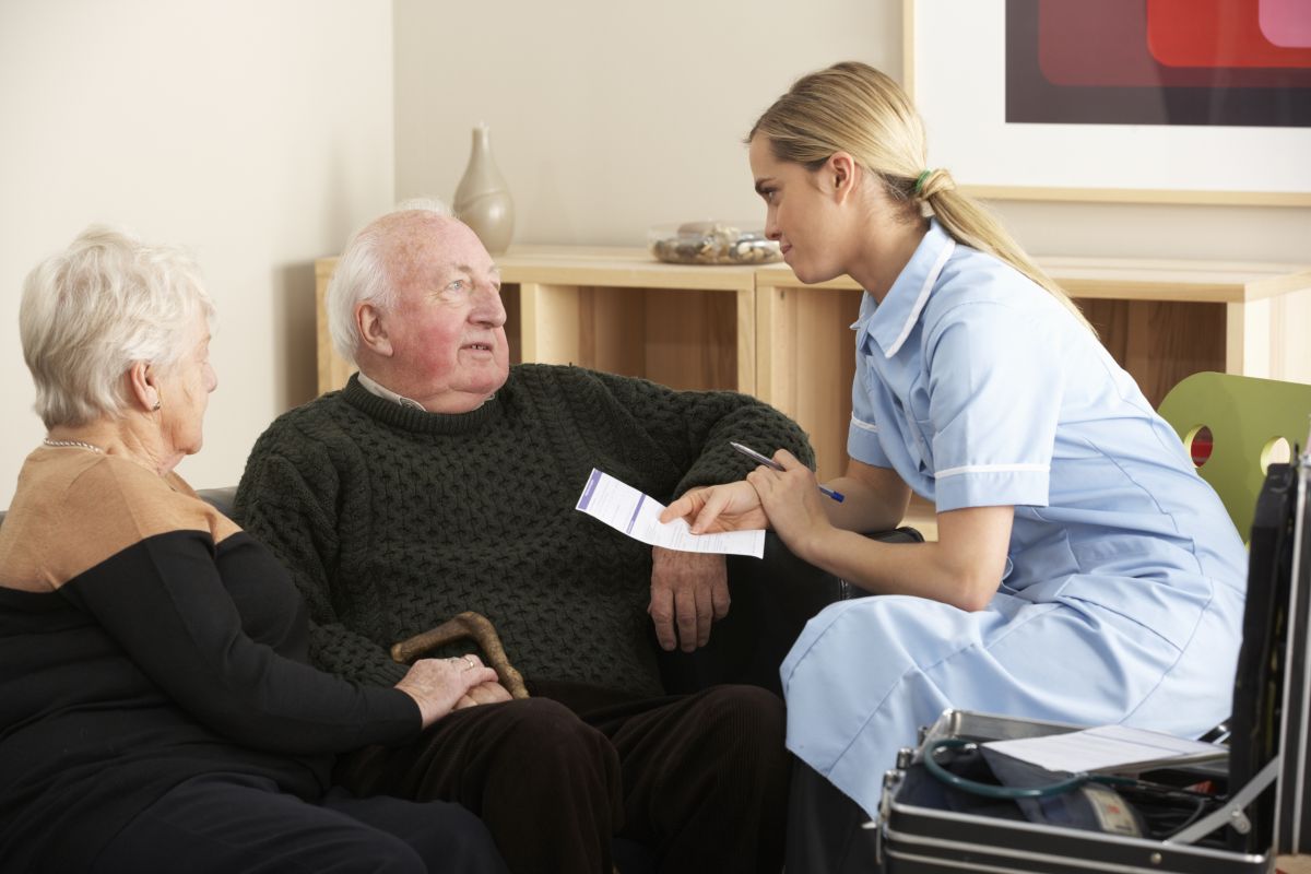 Elderly couple having a consultation with a healthcare professional