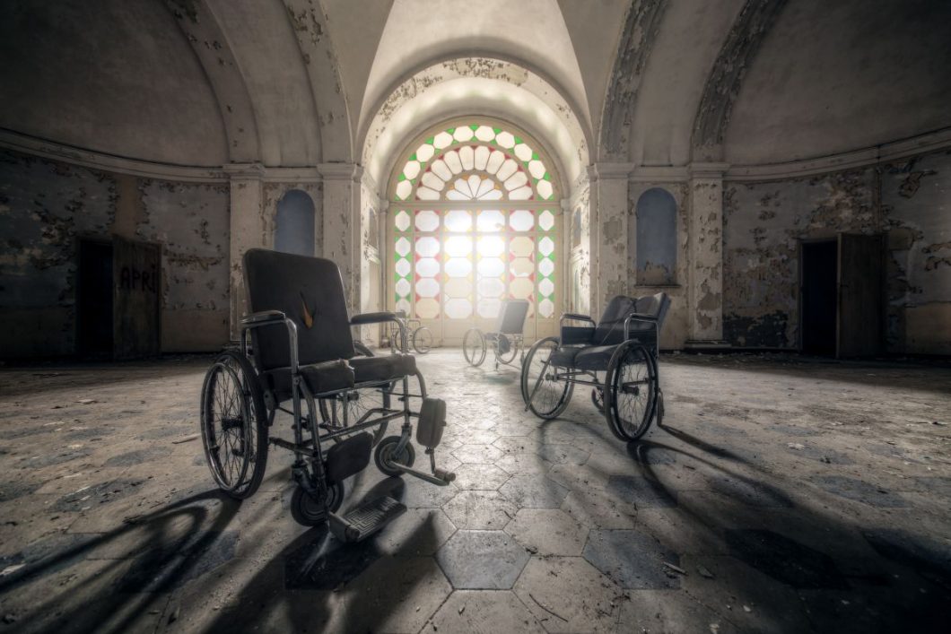 Empty wheelchairs in an abandoned healthcare facility